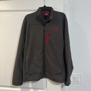 The North Face Charcoal Jacket with Vibrant Red Logo